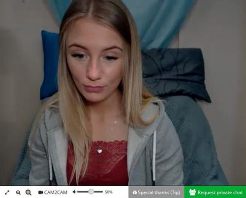 Blue eyed blonde webcam host