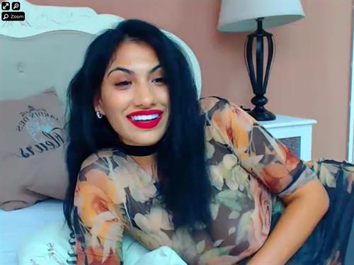 Fiery Italian cam model wears floral on xLoveCam.com